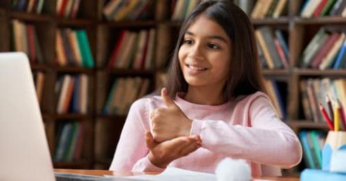 A student participating in an online club to learn a new language. 